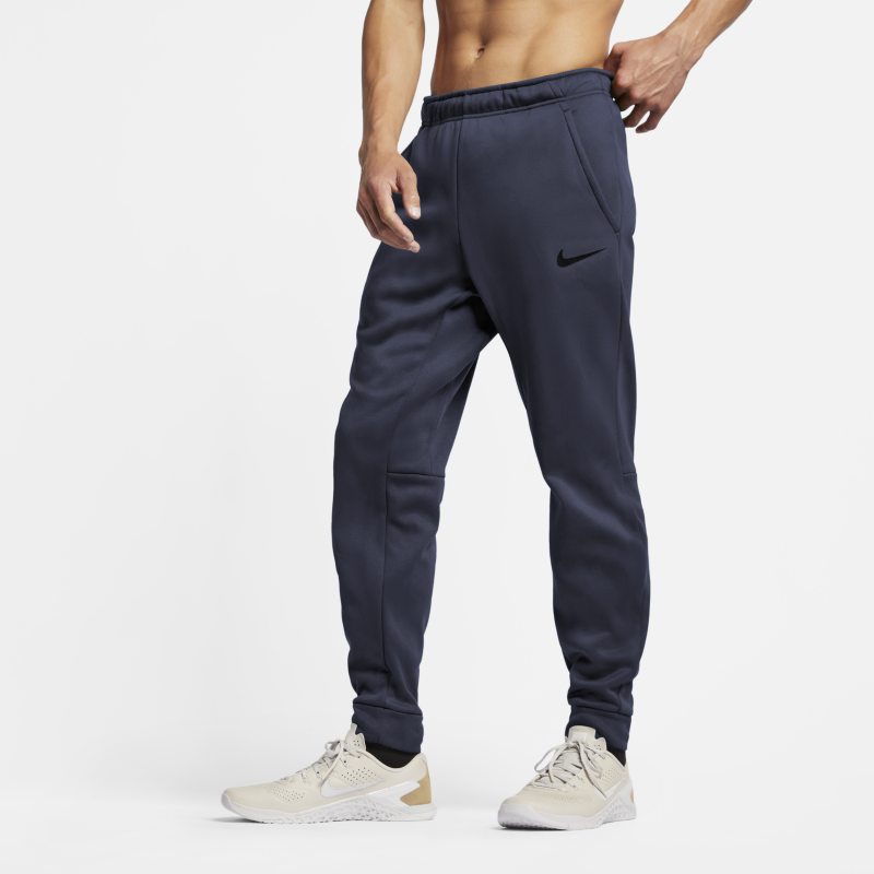 Avsmalnande träningsbyxor Nike Therma-FIT för män - Blå