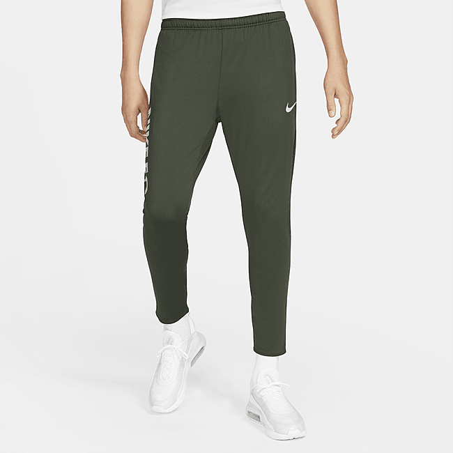 фото Мужские футбольные брюки nike f.c. essential - зеленый