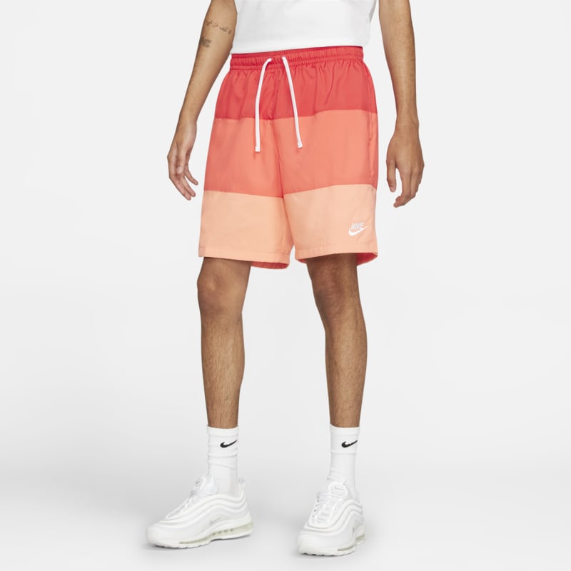 Luftiga, vävda shorts Nike Sportswear City Edition för män - Röd