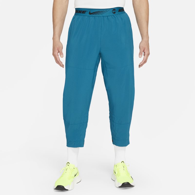 Męskie spodnie treningowe Nike Sport Clash - Niebieski