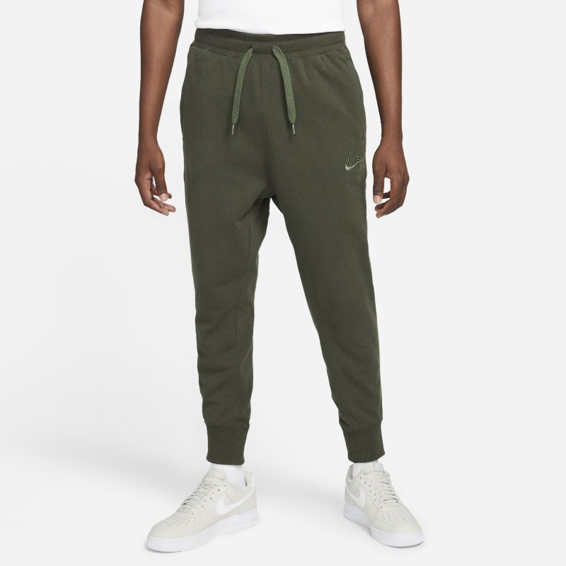 Męskie klasyczne spodnie z dzianiny Nike Sportswear - Brązowy