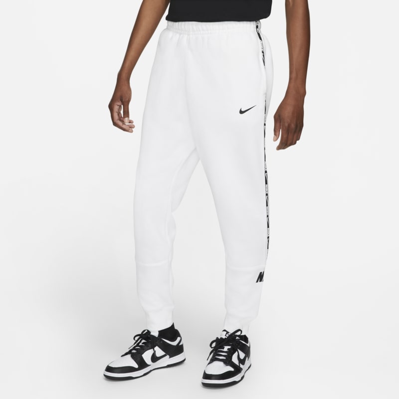 Męskie dzianinowe spodnie typu jogger Nike Sportswear - Biel