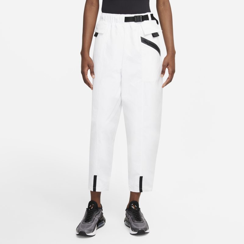 Damskie spodnie z tkaniny o kroju podkreślającym kształt ciała Nike Sportswear Tech Pack - Biel