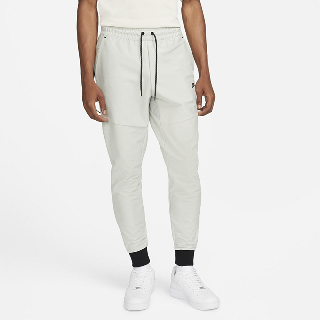 Мужские брюки из тканого материала без подкладки Nike Sportswear Dri-FIT Tech Pack - Серый
