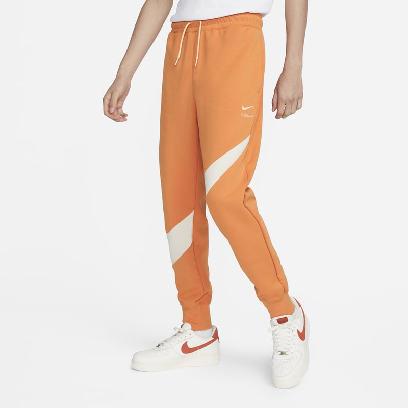 Spodnie męskie Nike Sportswear Swoosh Tech Fleece - Pomarańczowy