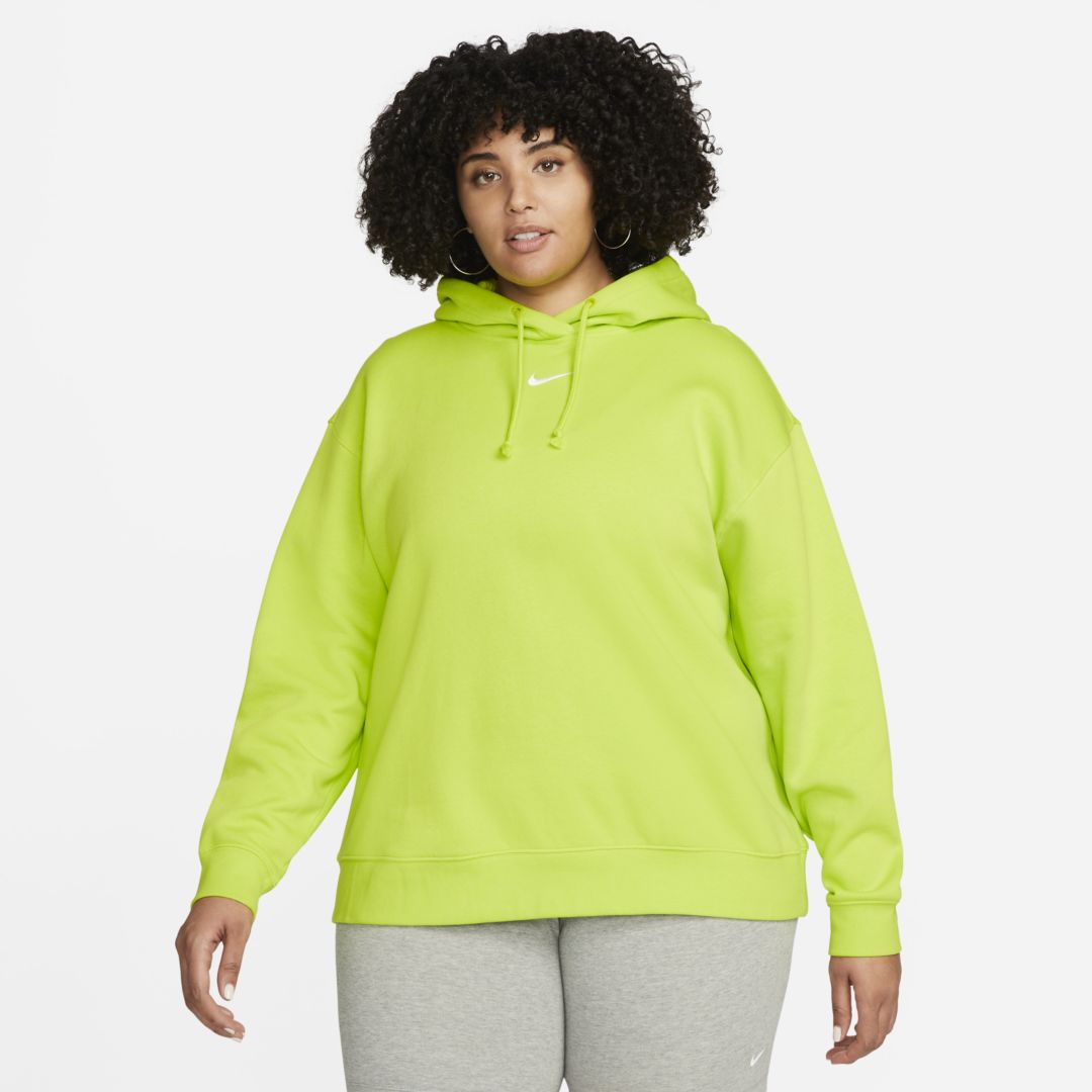 Woman modeling plus size lime green hoodie
