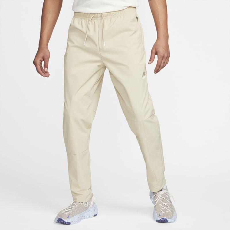 Męskie spodnie dresowe z tkaniny Nike Sportswear - Brązowy