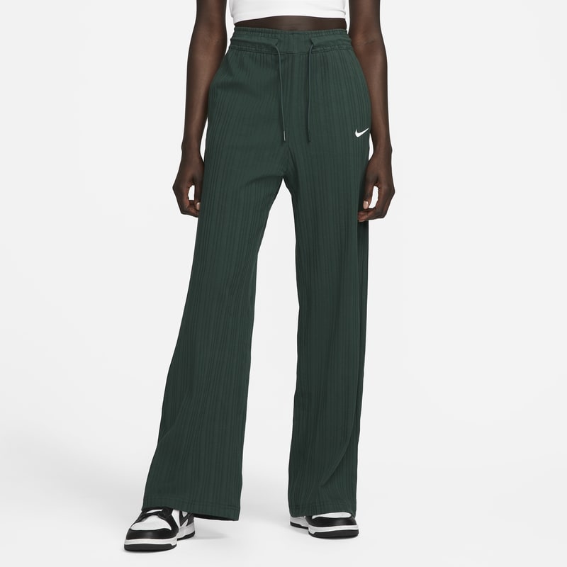 Ribbade byxor i jerseymaterial Nike Sportswear med vida ben för kvinnor - Grön