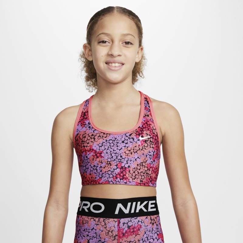 Dwustronny stanik sportowy z nadrukiem dla dużych dzieci (dziewcząt) Nike Dri-FIT Swoosh - Różowy