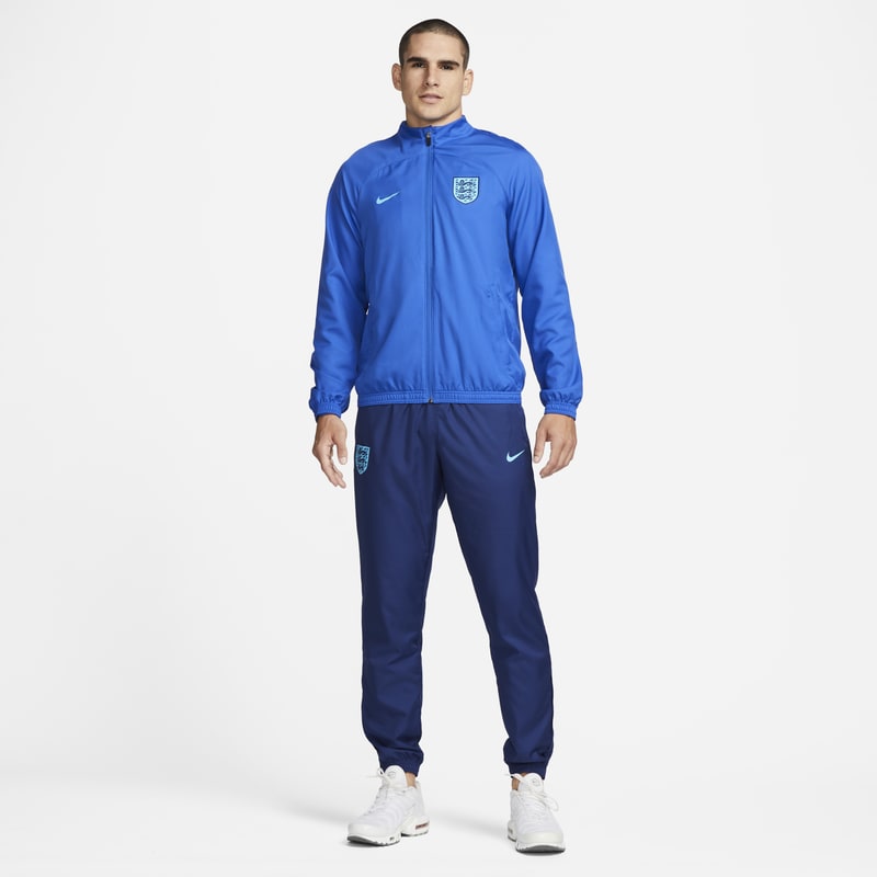 Męski dres piłkarski z tkaniny Nike Dri-FIT Anglia Strike - Niebieski