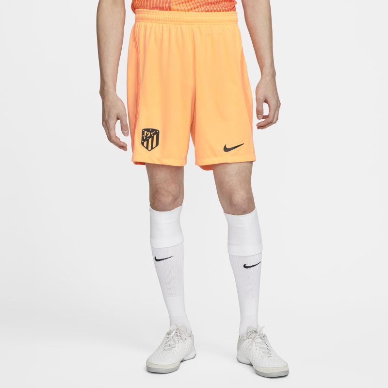 Męskie spodenki piłkarskie Nike Dri-FIT Atlético Madryt Stadium 2022/23 (wersja trzecia) - Pomarańczowy
