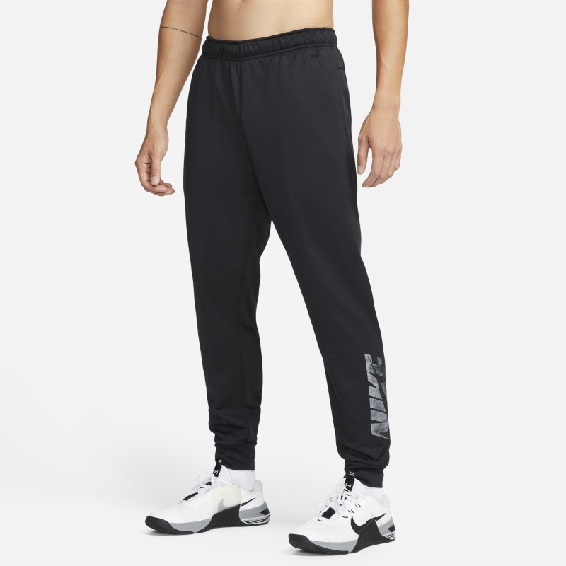 Träningsbyxor Nike Therma-FIT med Swoosh och tryck i avsmalnande modell för män - Svart