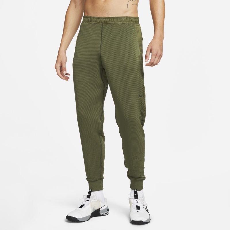Nike Therma-FIT ADV A.P.S. Träningsbyxor i fleece för män - Grön