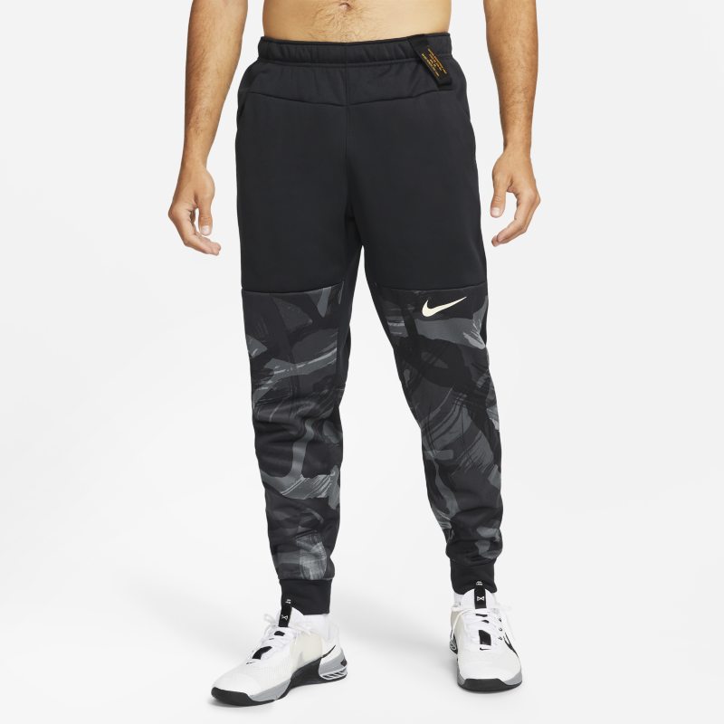 Avsmalnande träningsbyxor med kamouflagemönster Nike Therma-FIT för män - Svart
