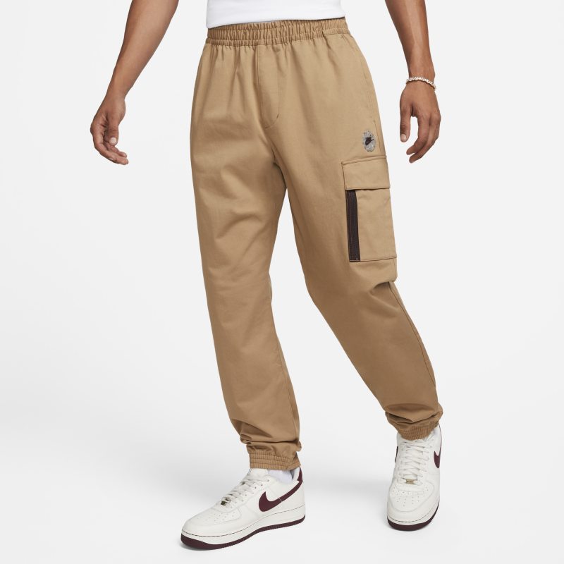 Męskie spodnie sportowe z tkaniny utility Nike Sportswear - Brązowy