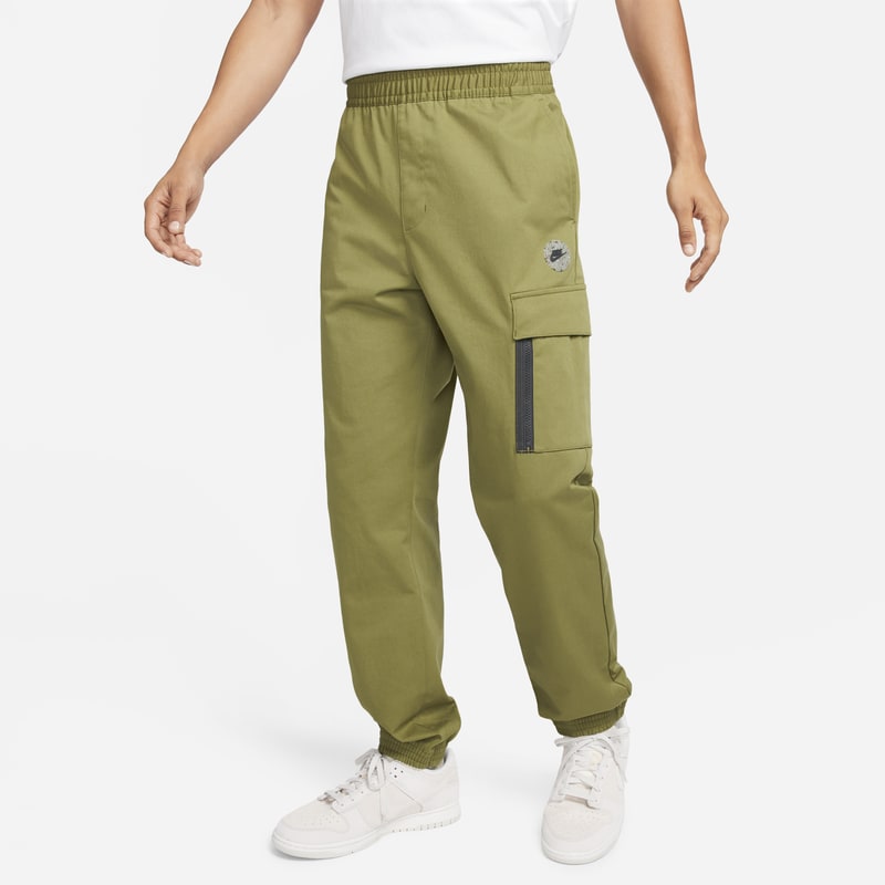 Męskie spodnie sportowe z tkaniny utility Nike Sportswear - Zieleń
