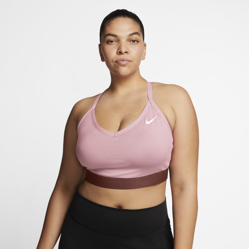 Damski stanik sportowy z wkładkami zapewniający lekkie wsparcie Nike Dri-FIT Indy (duże rozmiary) - Różowy