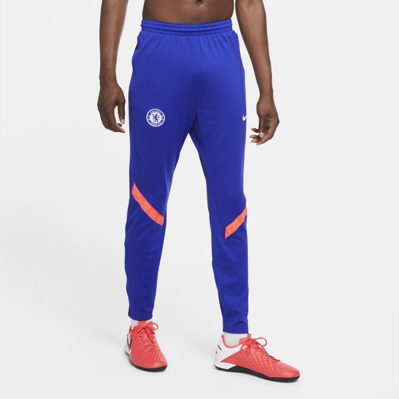 Męskie dresowe spodnie piłkarskie Chelsea FC Strike - Niebieski
