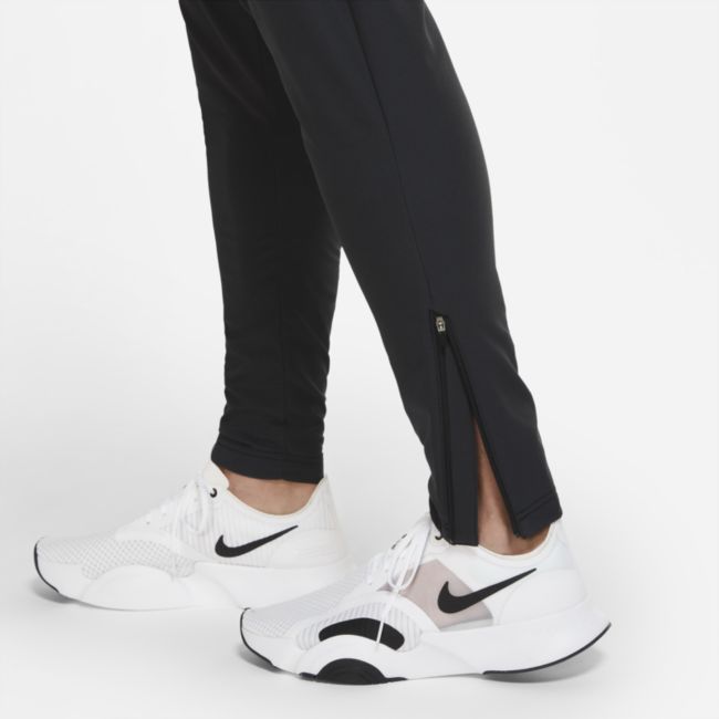 Męskie spodnie treningowe z tkaniny na zimę Nike - Czerń