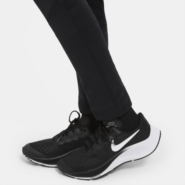Spodnie treningowe o zwężanym kroju z nadrukiem dla dużych dzieci (chłopców) Nike Therma - Czerń