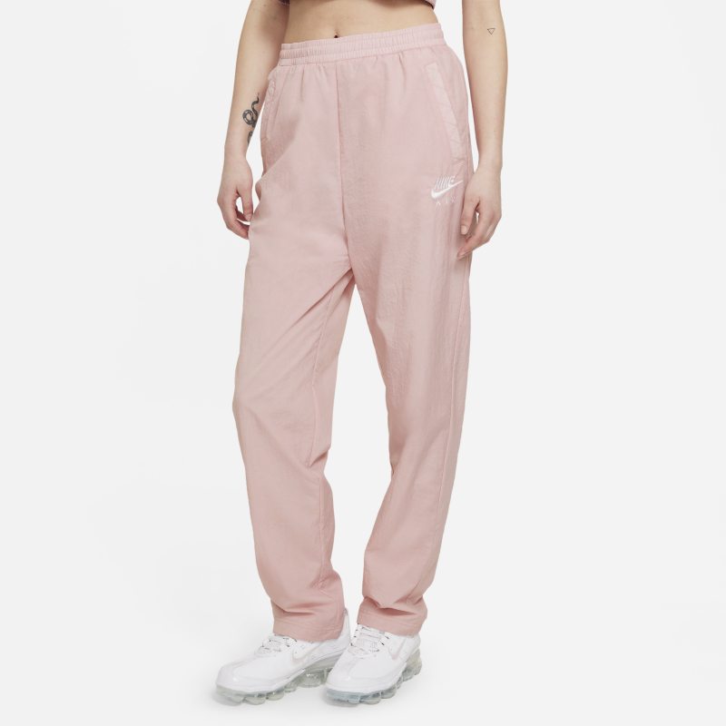 Damskie spodnie z tkaniny Nike Air - Różowy