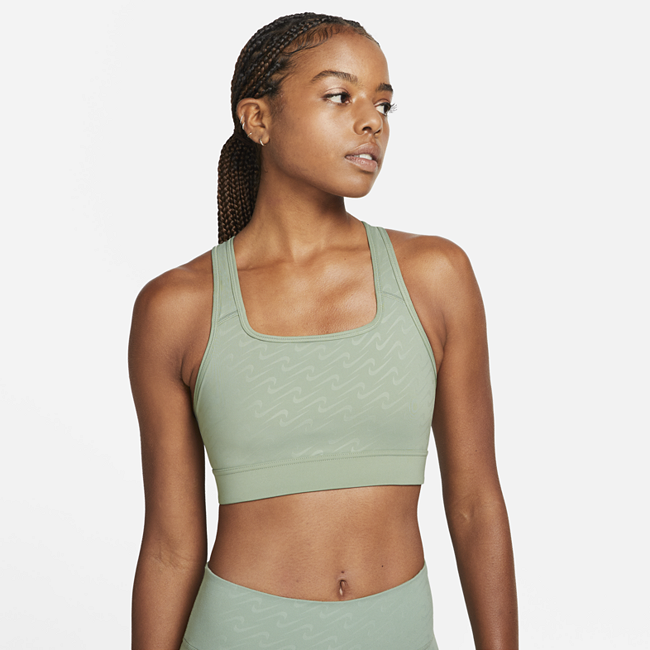 Image of Brassière de sport imprimée à maintien normal avec coussinet une pièce Nike Dri-FIT Swoosh Icon Clash pour Femme - Vert