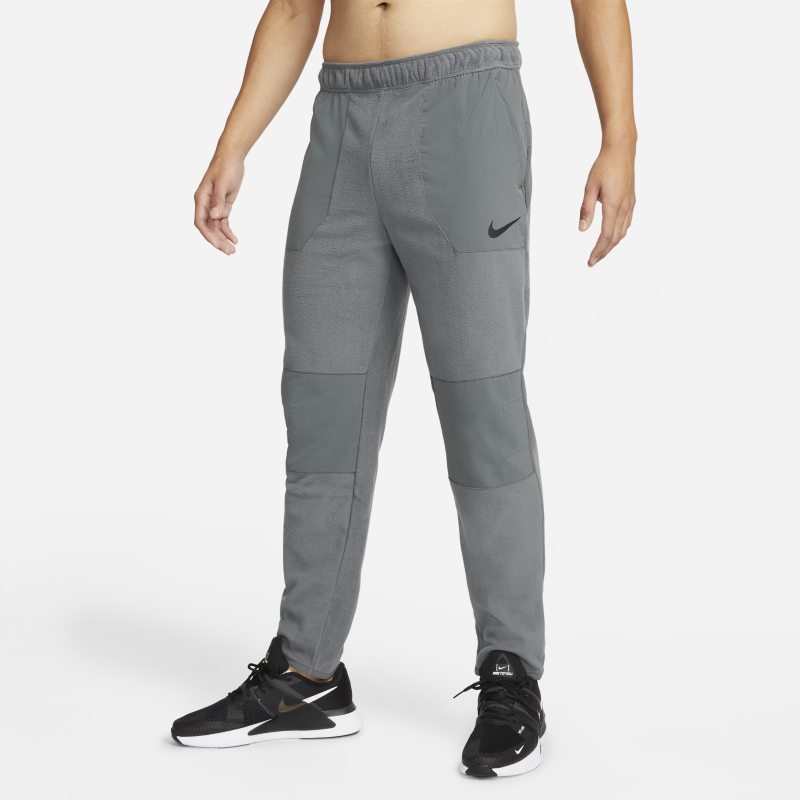 Nike Therma-FIT Pantalón de entrenamiento para el invierno - Hombre - Gris