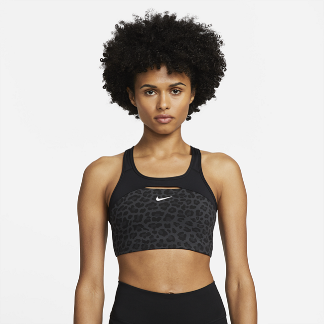 Image of Brassière de sport imprimée non rembourrée à maintien normal Nike Dri-FIT Swoosh pour Femme - Gris